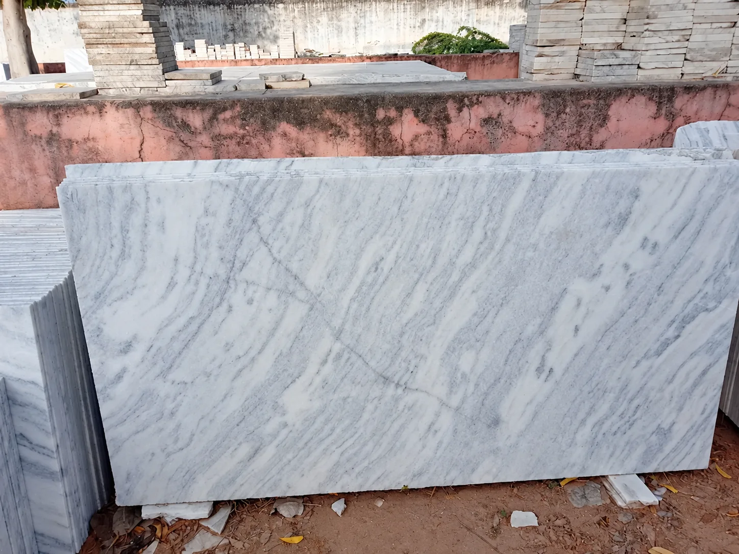 White marble slab with diagonal grey veining from the Geeta Marble Construction business gallery