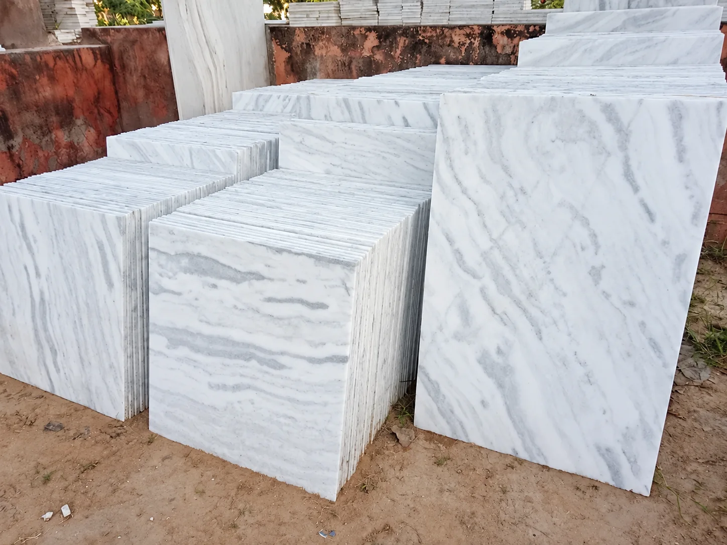 Veined marble tiles and slab stock photographed for Geeta Marble Construction