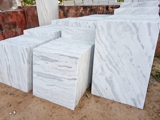 Veined marble tiles and slab stock — enhanced business photograph