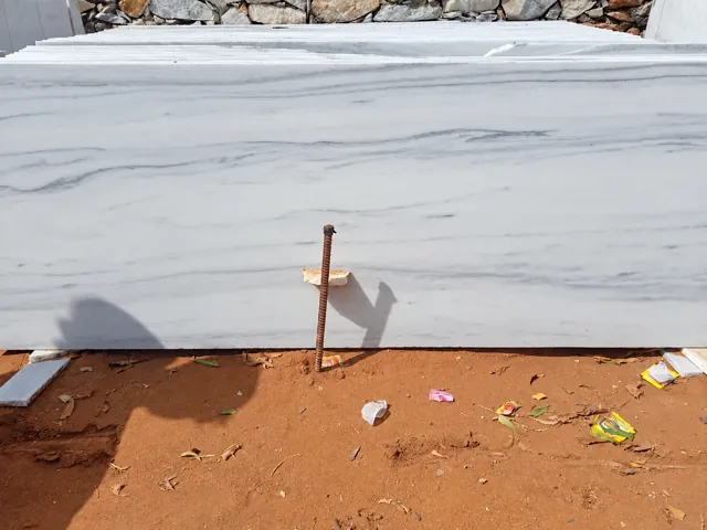 Close view of light marble slab stock — enhanced business photograph