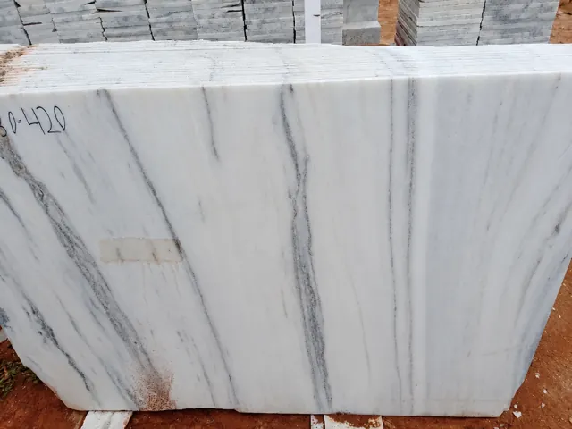 White marble slab with fine vertical veining — enhanced business photograph