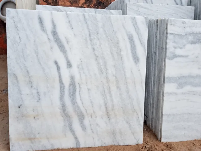 White and grey marble tiles from the stock yard — enhanced business photograph