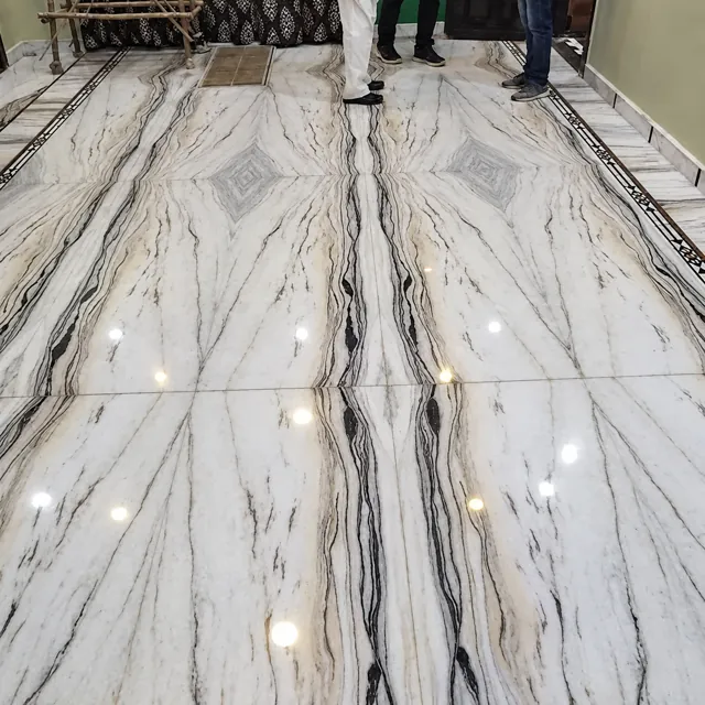 Polished bookmatched marble floor — enhanced business photograph