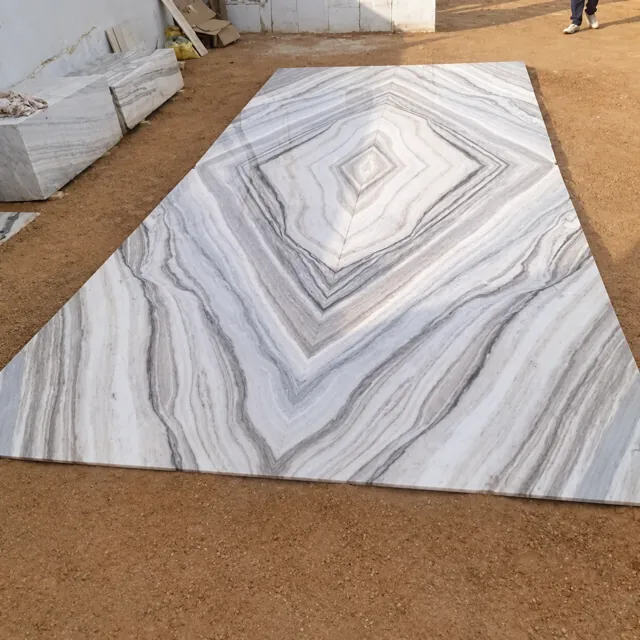 Bookmatched marble pieces with a diamond pattern — enhanced business photograph