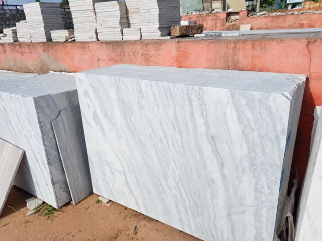 Diagonal-veined white marble tiles — enhanced business photograph