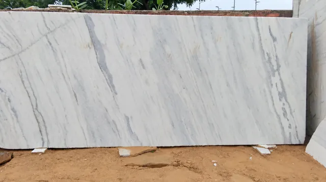 White marble slab with flowing grey veins — enhanced business photograph